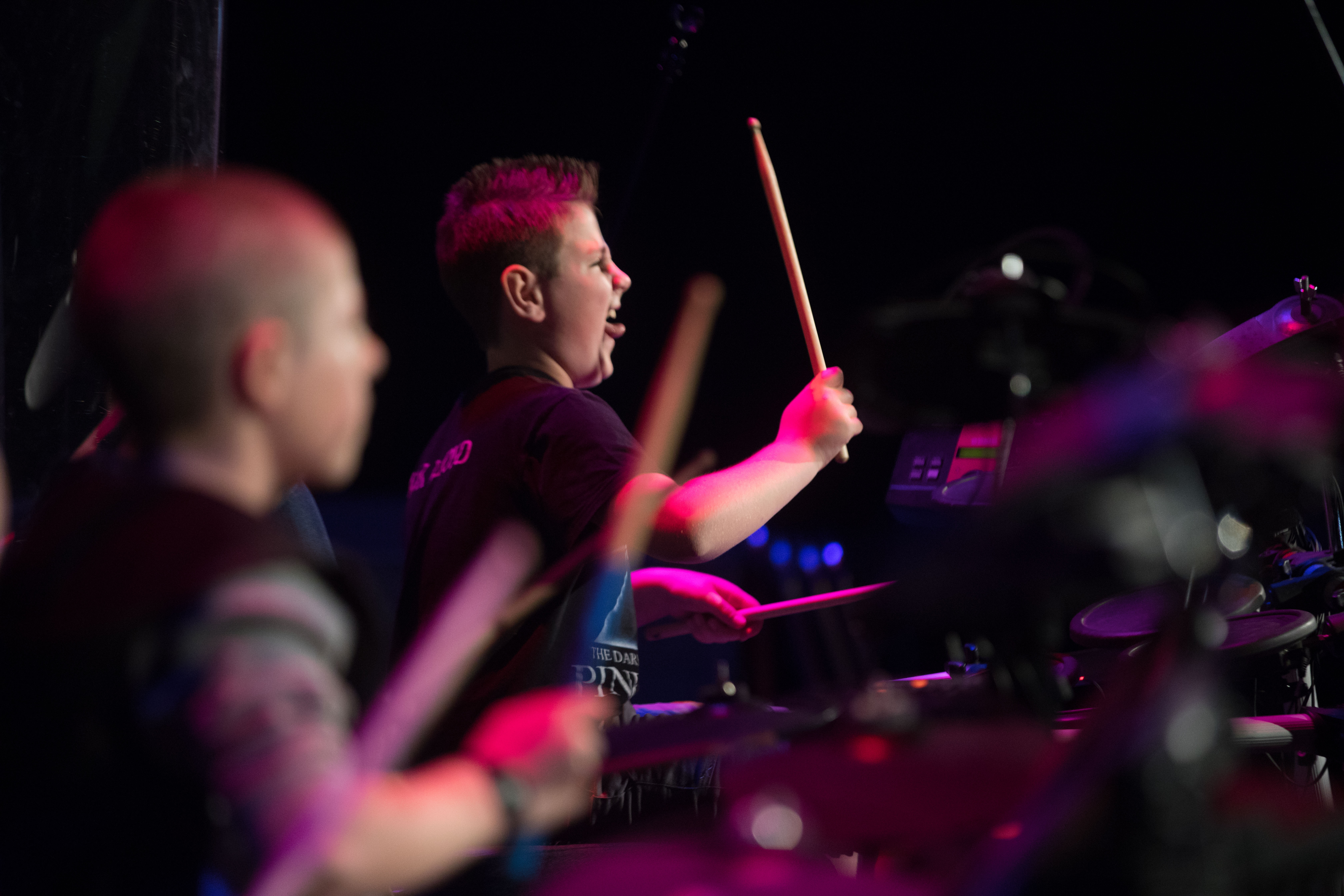 Student performing on drums at Harborfields Music Center recital